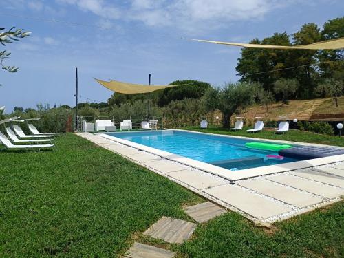 a swimming pool in the middle of a yard at Casa Vacanze Nino Petrelli in Naso