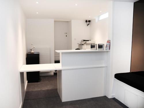 Una cocina o zona de cocina en Hotel Satellite