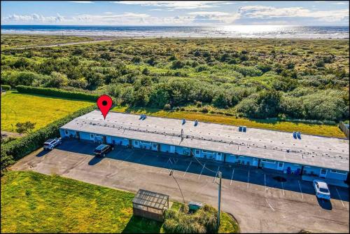 an overhead view of a building with a red heart on it at Sea Star Condo in Ocean Shores