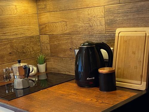 a coffee maker sitting on a kitchen counter at Cerla Korbielów in Korbielów