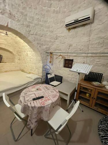 Posezení v ubytování Music House a Castellana Grotte confinante via per Turi 500m dalle Grotte
