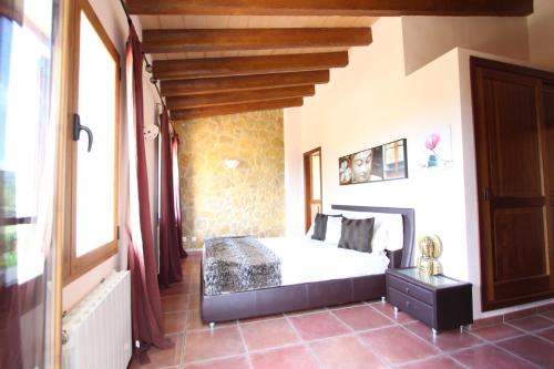 a bedroom with a bed in a room at Villa Puerto Adriano in El Toro