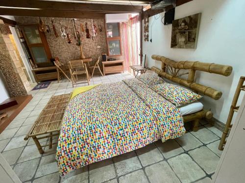 Postel nebo postele na pokoji v ubytování Music House a Castellana Grotte confinante via per Turi 500m dalle Grotte