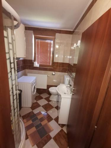 Ένα μπάνιο στο Apartmani G&E