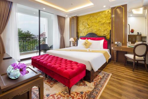 Giường trong phòng chung tại Da Lat Prince Hotel