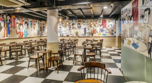 Un restaurante o sitio para comer en The Citi Residenci Hotel - Durgapur