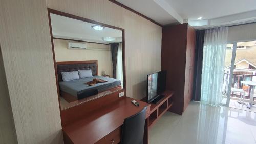 Televisyen dan/atau pusat hiburan di Shiba Guesthouse