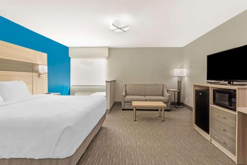 Krevet ili kreveti u jedinici u okviru objekta Best Western Plus Magnolia Inn & Suites
