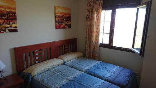 Postel nebo postele na pokoji v ubytování APARTAMENTO CON VISTAS AL MAR. 2 DORMITORIOS.