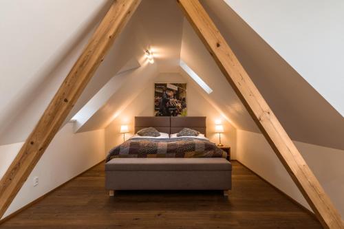 Postel nebo postele na pokoji v ubytování Aparthotel Tycho de Brahe