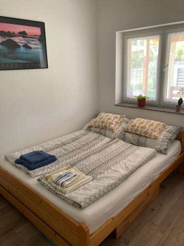 Кровать или кровати в номере Balati Vendégház