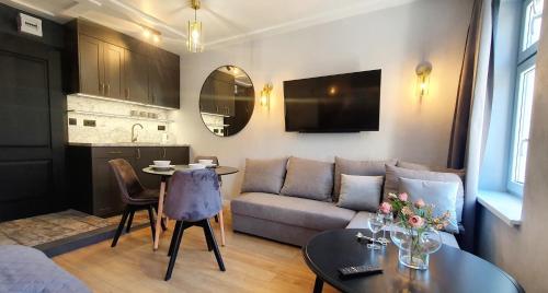 Χώρος καθιστικού στο DK Apartamenty Mendelsohna