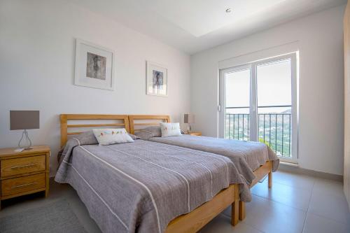 Katil atau katil-katil dalam bilik di Luxury Villa Fig with pool and Jacuzzi near Dubrovnik