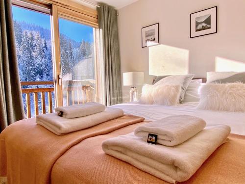 Posteľ alebo postele v izbe v ubytovaní Chalet Gouter- Great central location with Jacuzzi