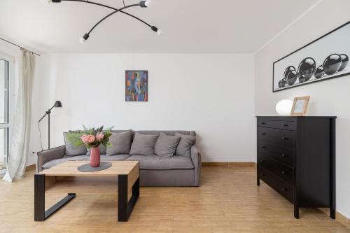 Posedenie v ubytovaní Pleasant Apartment with Terrace Cracow by Noclegi Renters