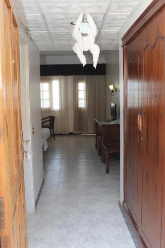 a room with a person hanging from the ceiling at Happy Life Village Dahab in Dahab