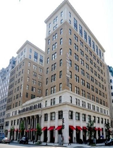a large building on the corner of a street at Global Luxury Suites at The White House in Washington