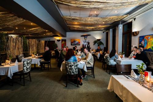 Restaurace v ubytování Hakunamatata Lodge & Health Spa