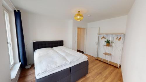 Ένα ή περισσότερα κρεβάτια σε δωμάτιο στο Travel Art Boardinghouse (Lazarettstr.)