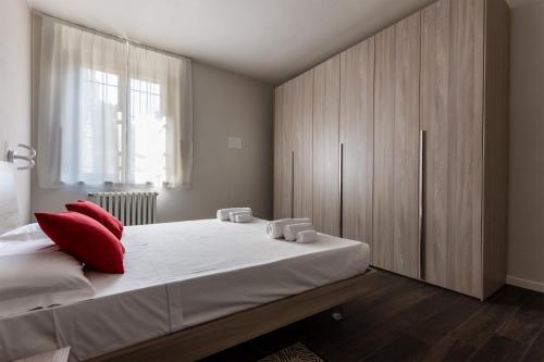 Postel nebo postele na pokoji v ubytování Sant'agnese apartment - Smart Holiday