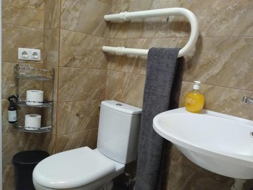Ванная комната в Sunrise Apartment