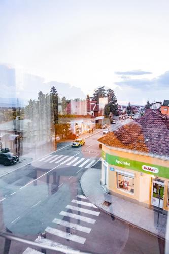 a view of a city street with a building at Apartmani Spirit in Kraljevo