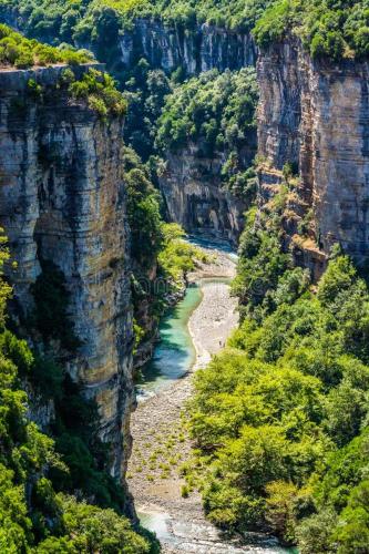 a view of a river in a canyon at Hotel Shpetimi in Çorovodë