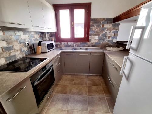 Η κουζίνα ή μικρή κουζίνα στο PS House New Port - PS Rental