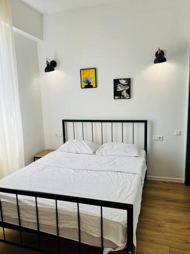 Ένα ή περισσότερα κρεβάτια σε δωμάτιο στο Ortachala Apartments
