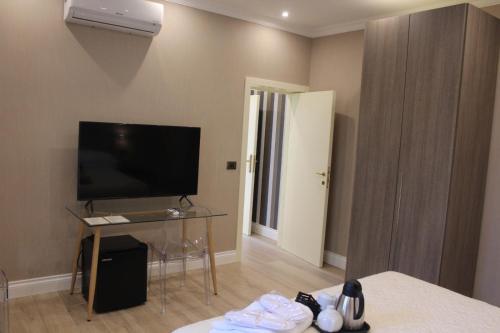 TV a/nebo společenská místnost v ubytování B&B The Garden