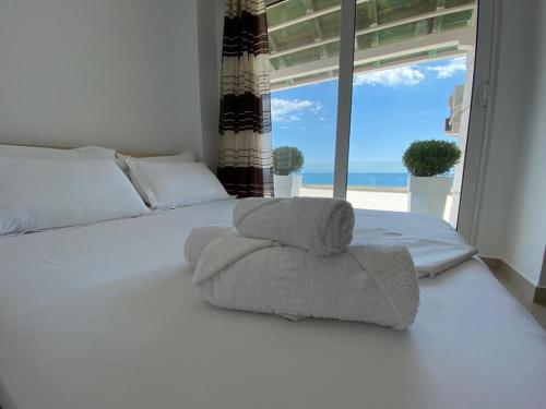 Katil atau katil-katil dalam bilik di Emily Boutique Hotel
