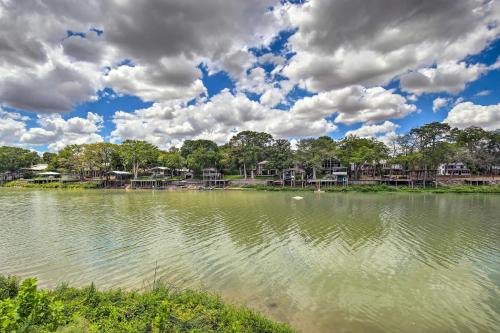 a body of water with clouds in the sky at Lake Placid Home with Dock and Grill! in Seguin