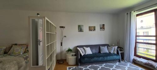 Posteľ alebo postele v izbe v ubytovaní Apartament Francuska Pokoje Rooms