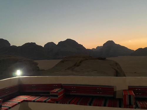a room with a view of the desert and mountains at Bronze Mountains Camp Wadi Rum in Aqaba