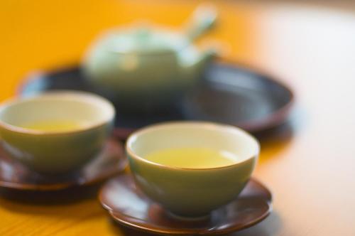 three cups of coffee sitting on a table at Sakaeya in Yamanouchi