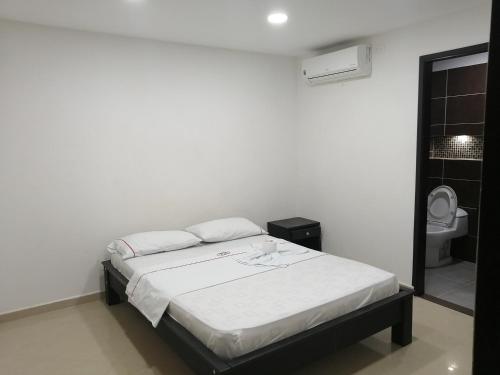 Ένα ή περισσότερα κρεβάτια σε δωμάτιο στο San pedro suite