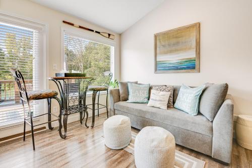 a living room with a couch and a table at Norris Lake Escape in Maynardville