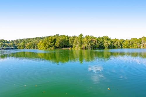 a large body of water with trees in the background at Norris Lake Escape in Maynardville
