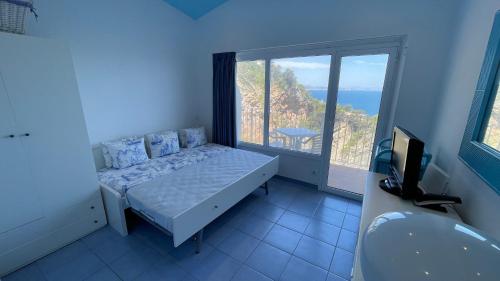 Posteľ alebo postele v izbe v ubytovaní Apartment in Cap Sa Sal
