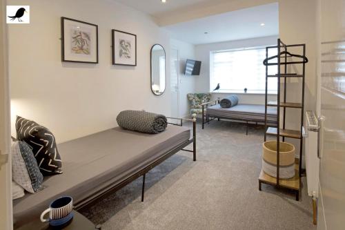 a hospital room with a bed and a ladder at Blackbird Accommodation and Luxury Apartments room 12 in Blackpool