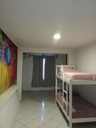 Katil atau katil-katil dalam bilik di Cataratas Jazz Hostel