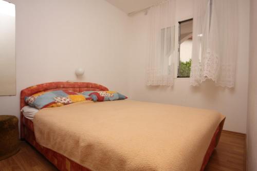 Posteľ alebo postele v izbe v ubytovaní Apartment Nin 6149b