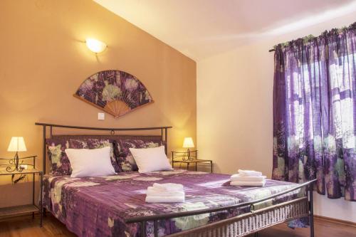 En eller flere senge i et værelse på Apartments by the sea Mali Iz (Iz) - 6163