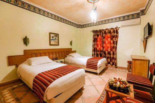 Hotel Kasbah Lamraniにあるベッド