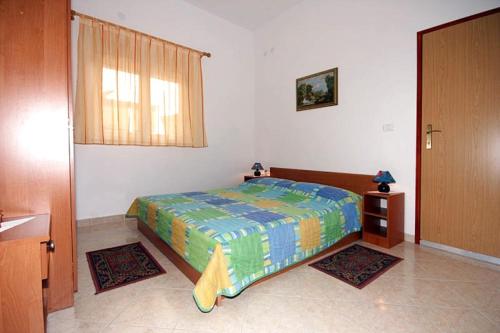 Postel nebo postele na pokoji v ubytování Apartment Pula 7420a