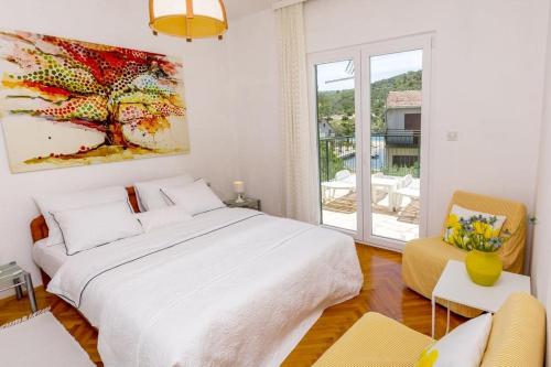 Posteľ alebo postele v izbe v ubytovaní Seaside holiday house Stupin Celine, Rogoznica - 6096
