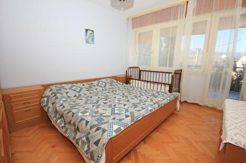 Postel nebo postele na pokoji v ubytování Apartments by the sea Mastrinka, Ciovo - 7582