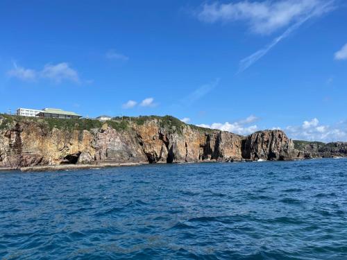 a view of a rocky island in the water at 白浜貸別荘2-76 in Kanayama