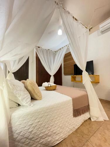 Katil atau katil-katil dalam bilik di Villa Tiê Paraty