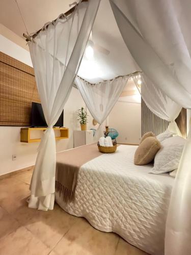 Katil atau katil-katil dalam bilik di Villa Tiê Paraty